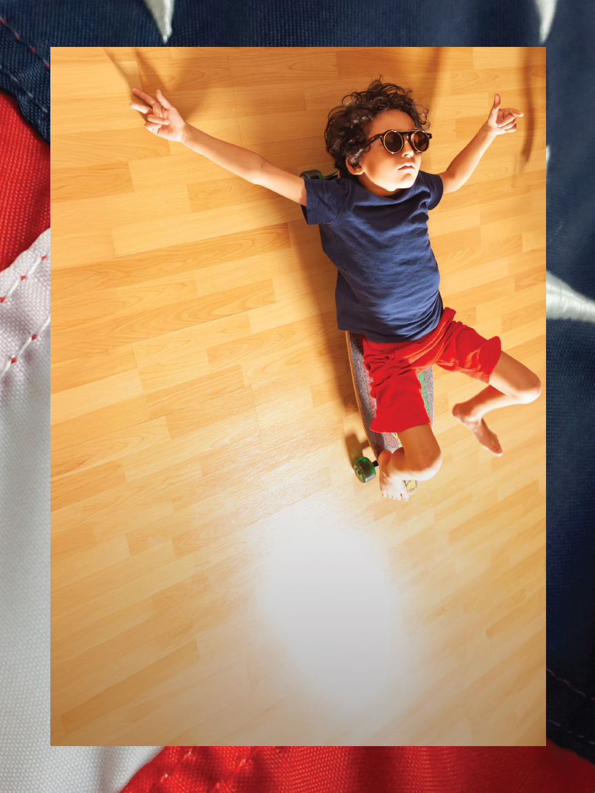 Kid on vinyl wood look flooring.