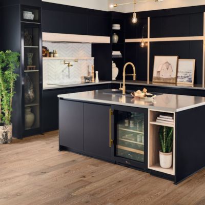 countertops in a modern kitchen with island and dark cabinets